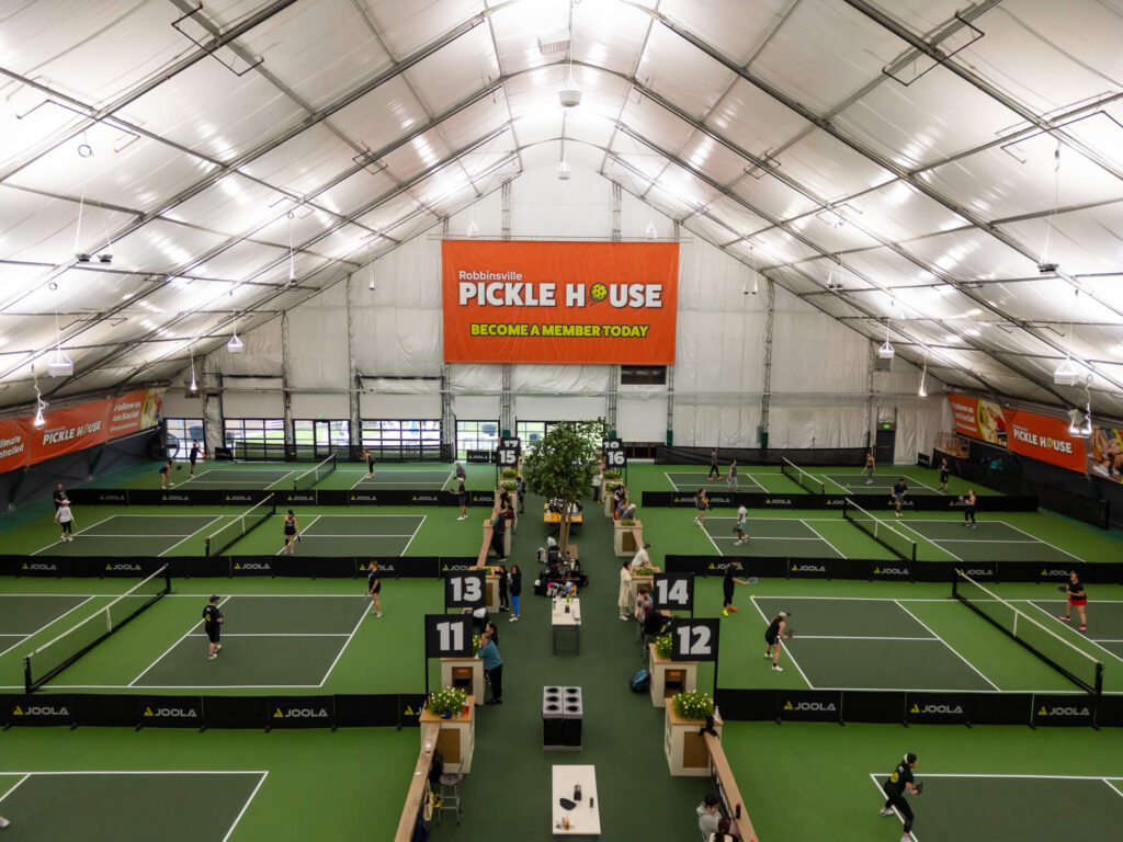 Pickle House tournament players on the pickleball court