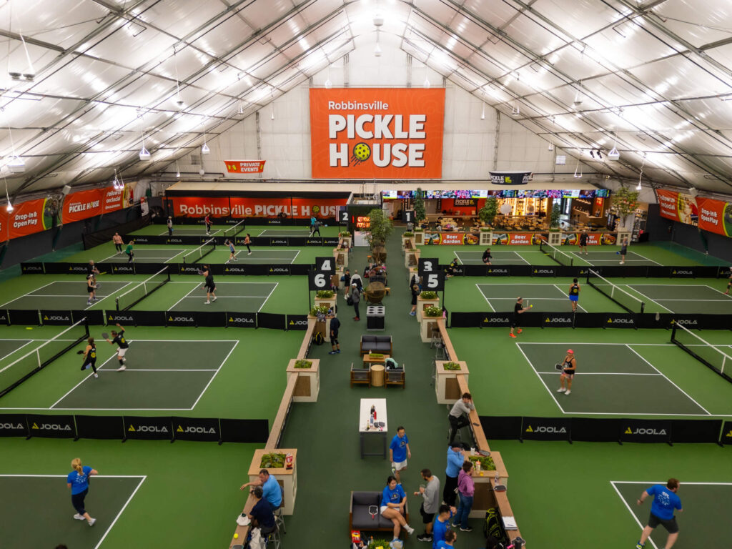 Pickle House tournament players on the pickleball court