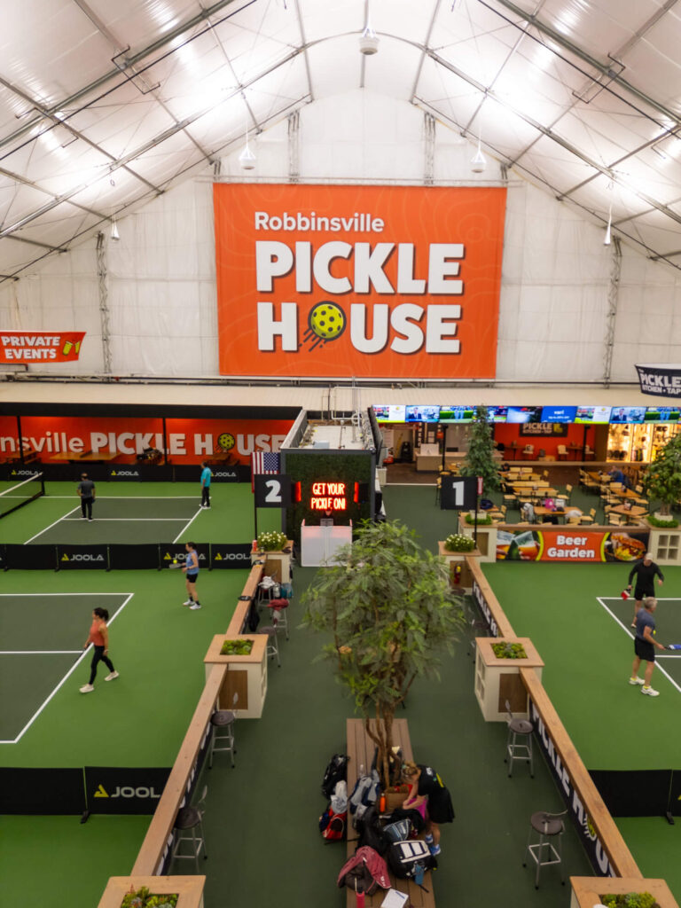 Pickle House tournament players on the pickleball court