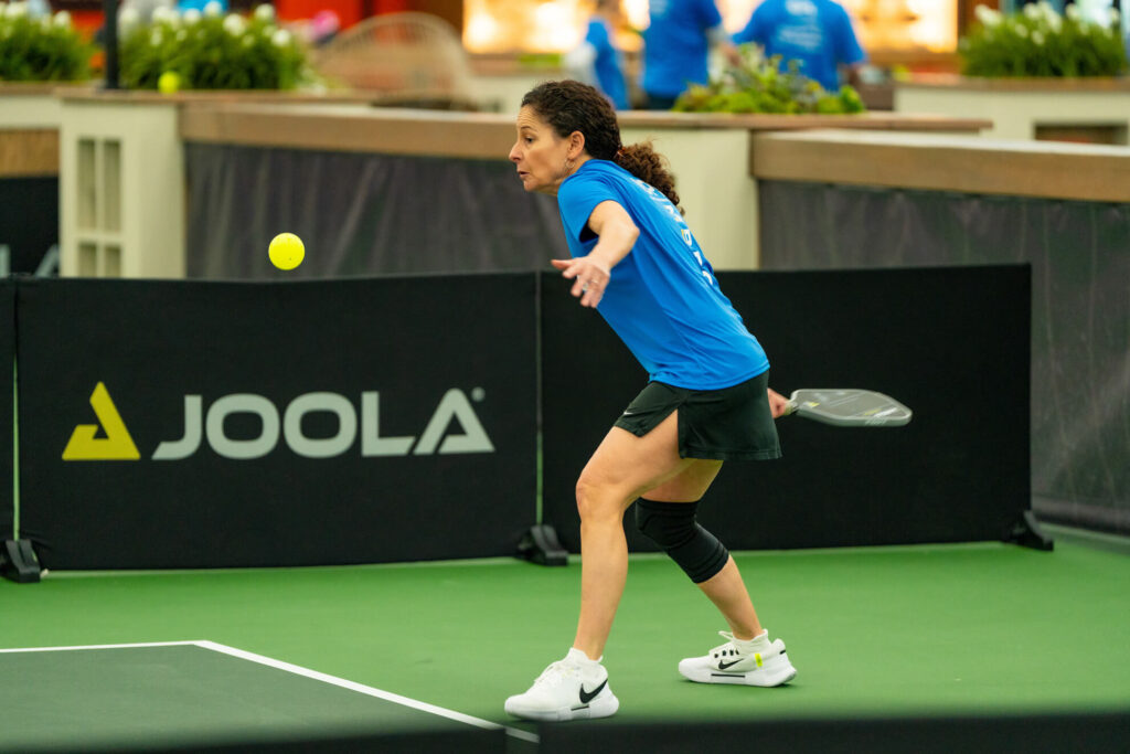 Pickle House tournament players on the pickleball court