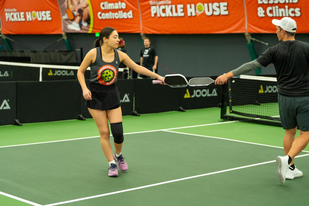 Pickle House tournament players on the pickleball court