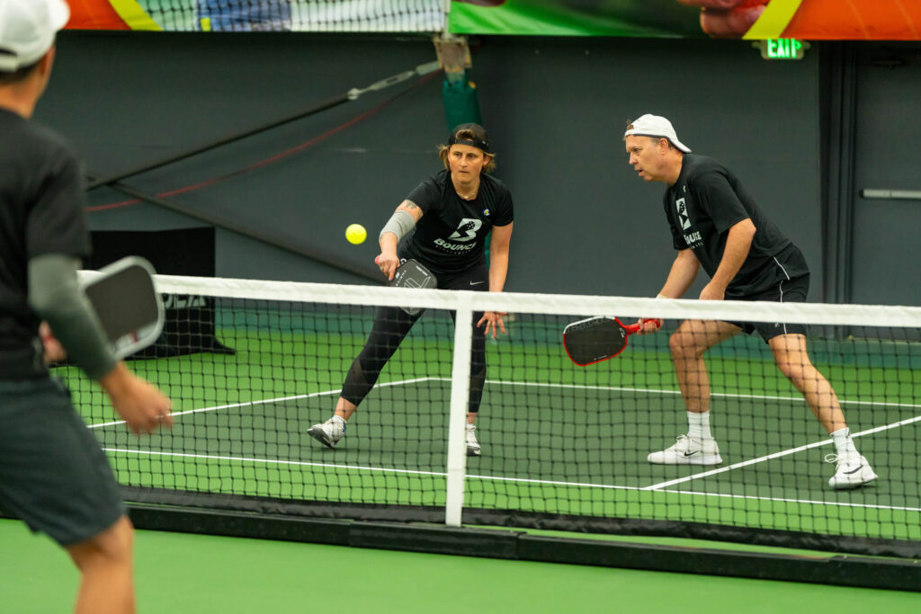 Pickle House tournament players on the pickleball court