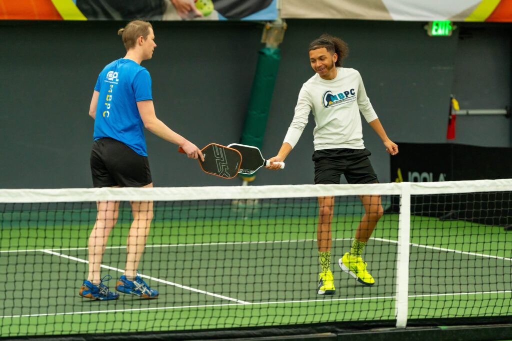 Pickle House tournament players on the pickleball court