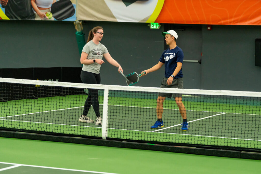 Pickle House tournament players on the pickleball court
