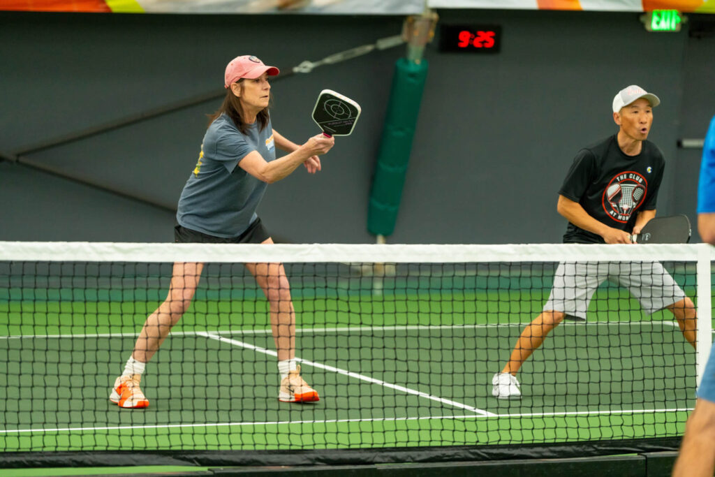 Pickle House tournament players on the pickleball court
