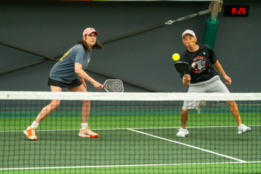 Pickle House tournament players on the pickleball court