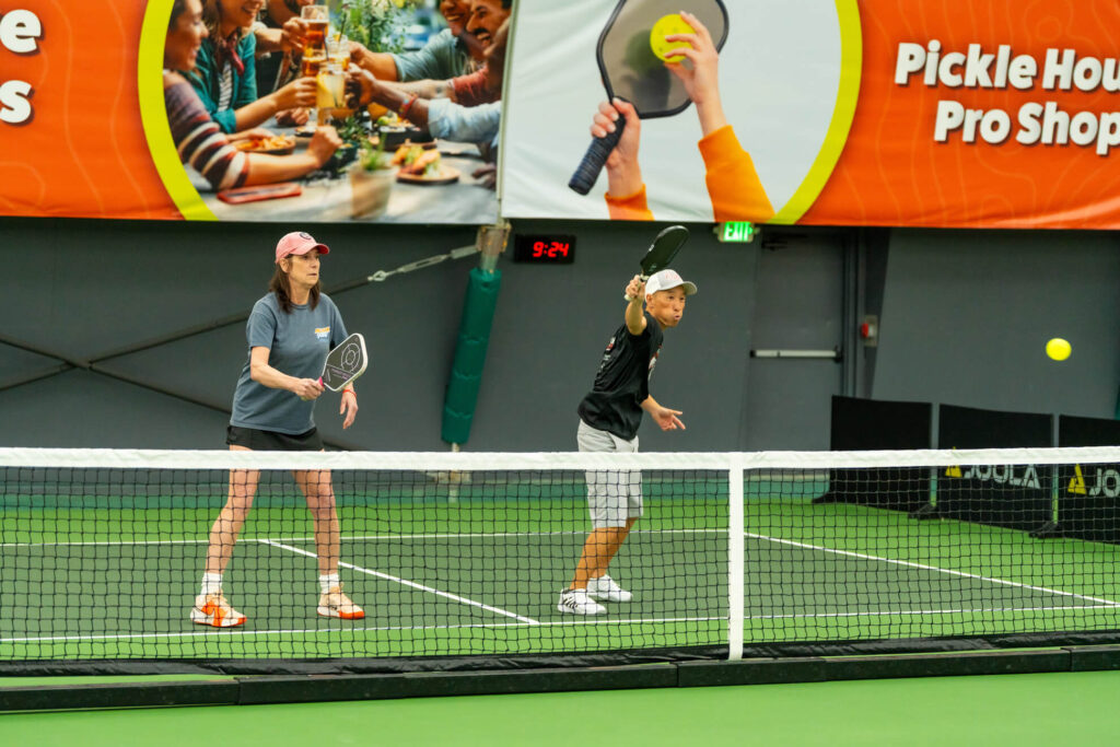 Pickle House tournament players on the pickleball court