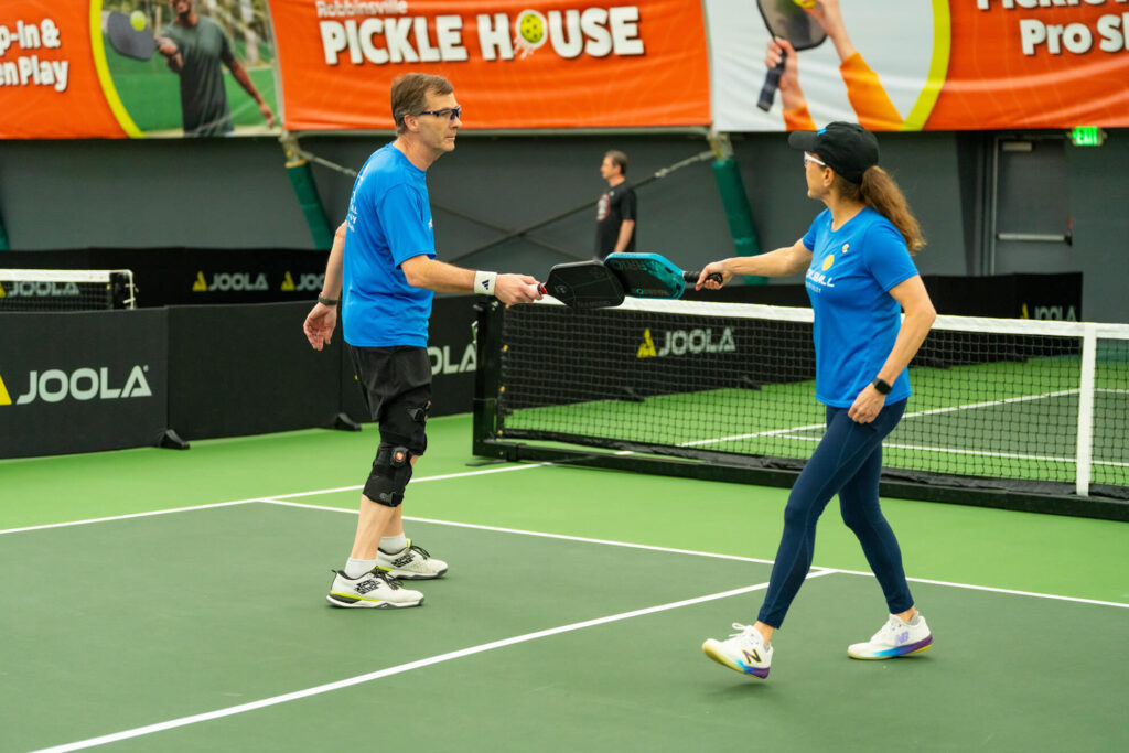 Pickle House tournament players on the pickleball court