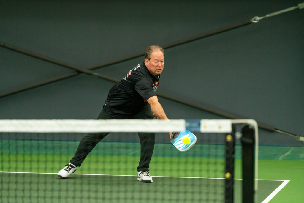 Pickle House tournament players on the pickleball court