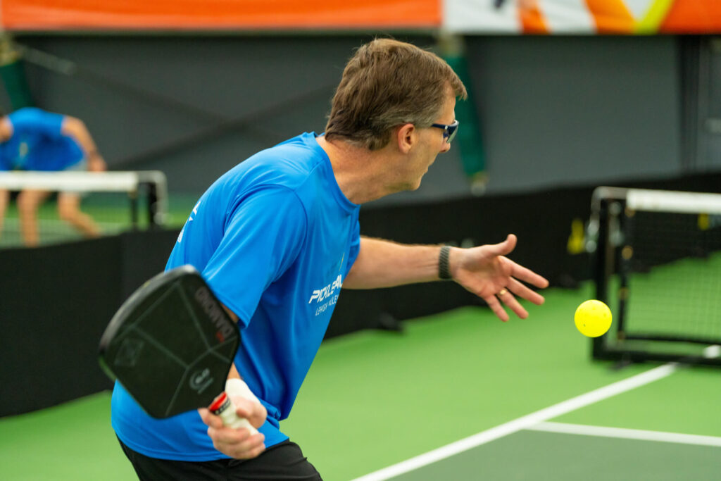 Pickle House tournament players on the pickleball court