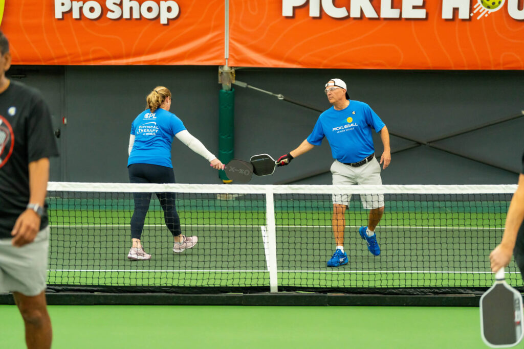 Pickle House tournament players on the pickleball court
