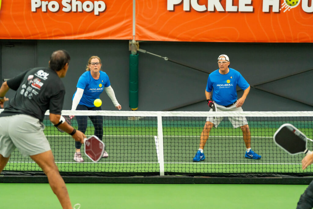 Pickle House tournament players on the pickleball court