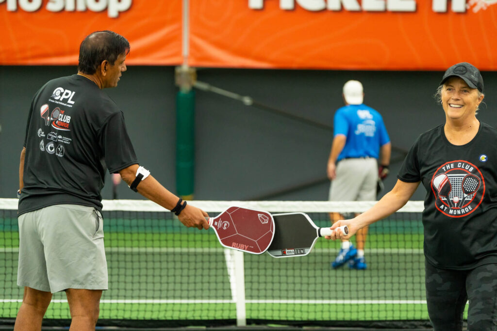 Pickle House tournament players on the pickleball court