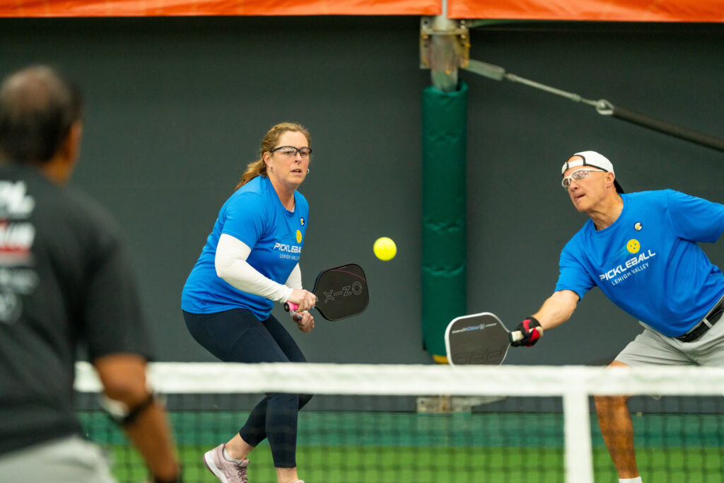 Pickle House tournament players on the pickleball court